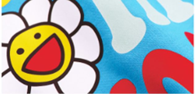 青地に笑顔の花と赤・白の模様が印刷されたインクカラー見本